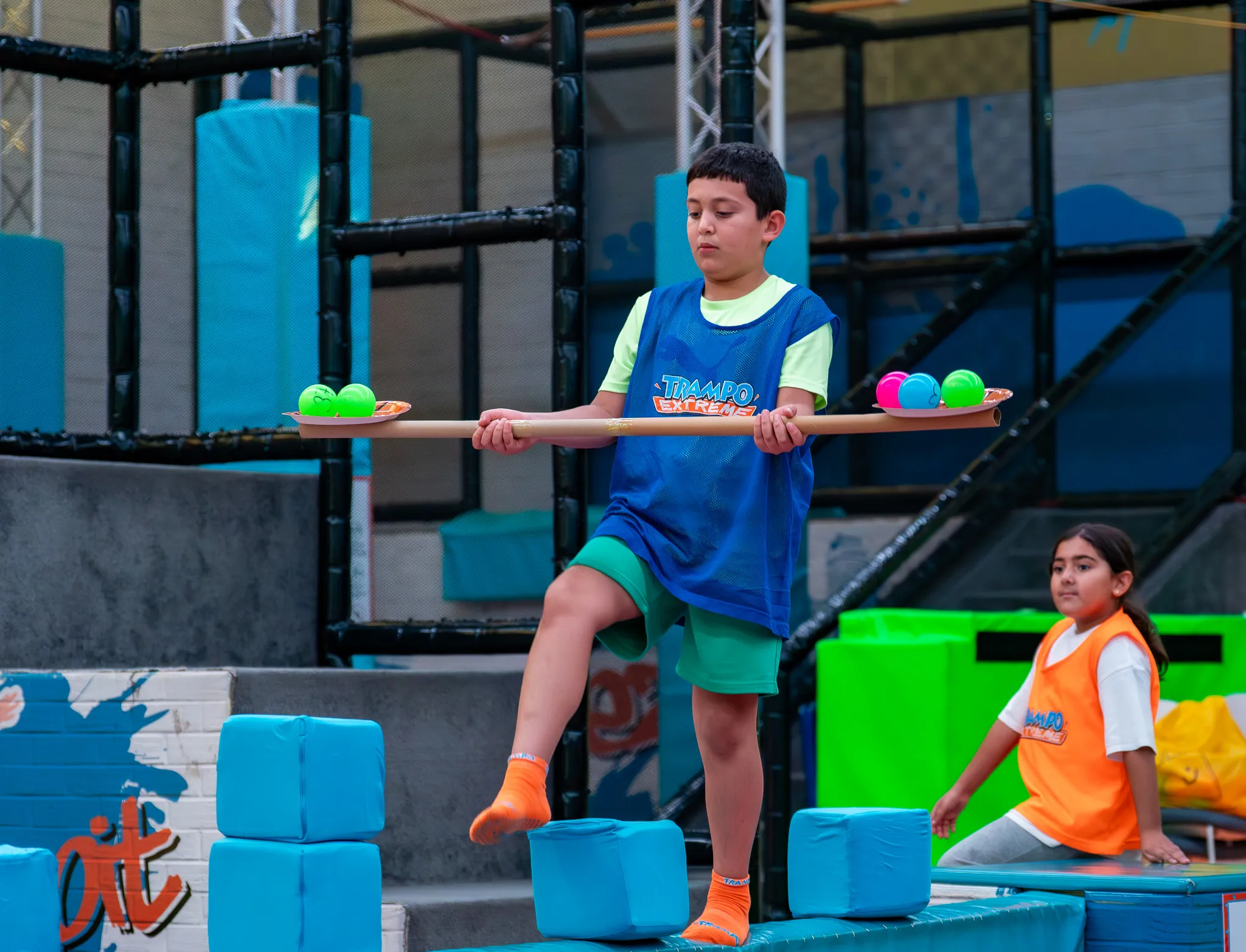 Boy on a balance challenge during Trampo Kuwait's winter camp