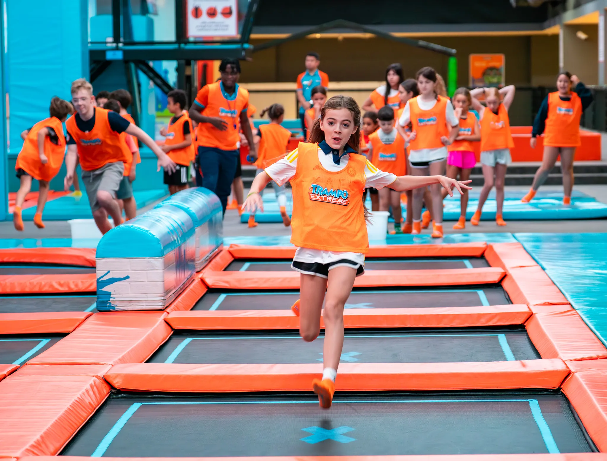 Kids playing on trampolines