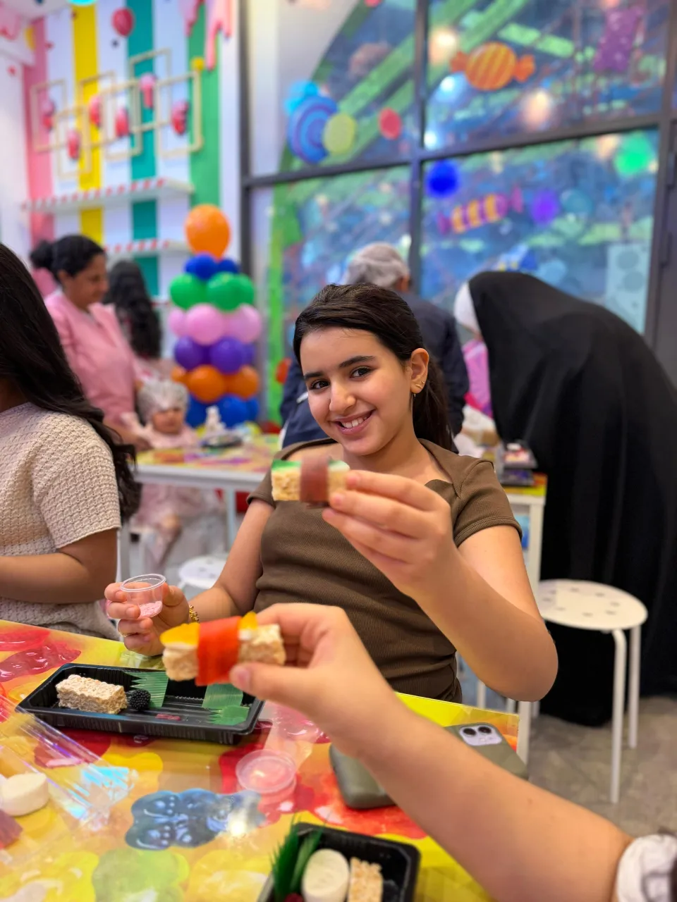 Kids making candy at Cricket's Candy Creations, Trampo Murouj