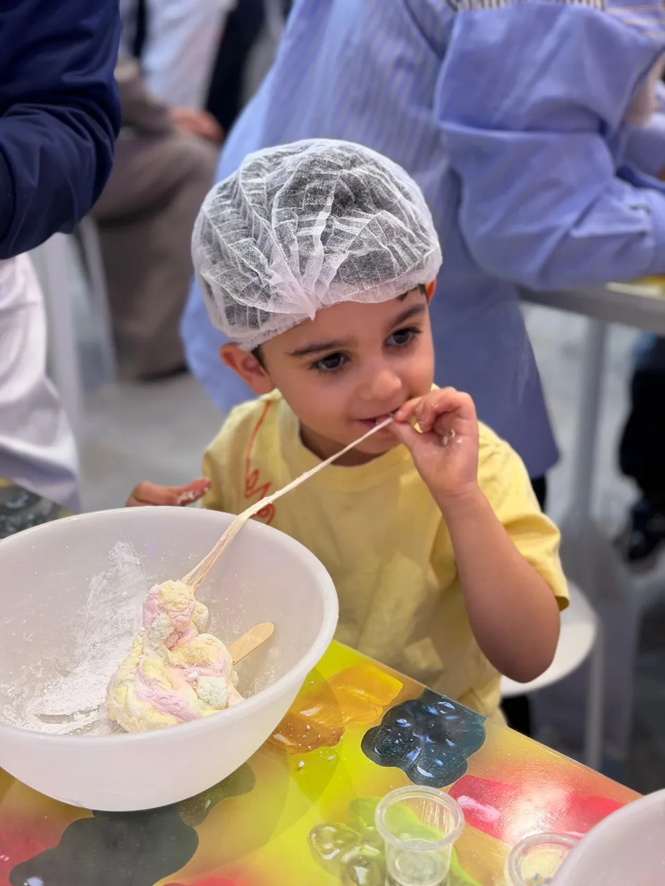 Kids making candy at Cricket's Candy Creations, Trampo Murouj