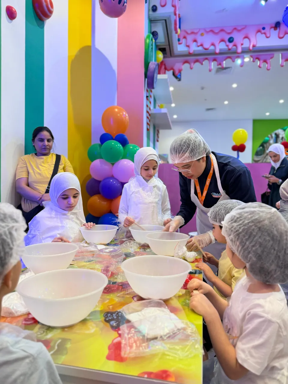 Kids making candy at Cricket's Candy Creations, Trampo Murouj