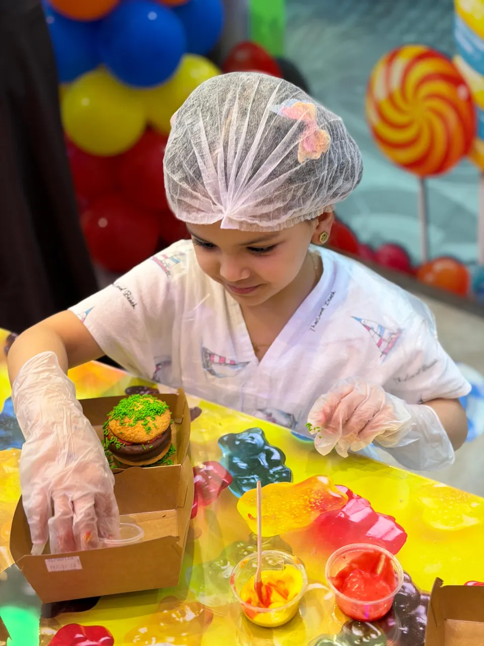 Kids making candy at Cricket's Candy Creations, Trampo Murouj
